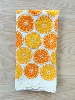 flour sack tea towel . oranges
