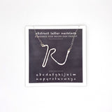 necklace . abstract letters