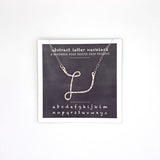 necklace . abstract letters