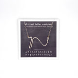necklace . abstract letters