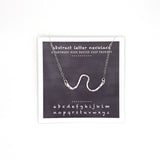 necklace . abstract letters