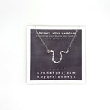 necklace . abstract letters