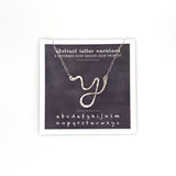 necklace . abstract letters