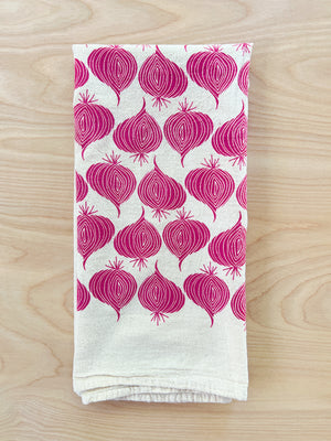 flour sack tea towel . red onions