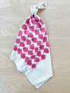 flour sack tea towel . red onions