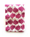 flour sack tea towel . red onions