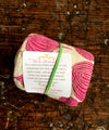 flour sack tea towel . red onions