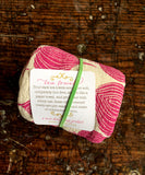 flour sack tea towel . red onions